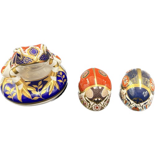 412 - Three Royal Crown Derby Paperweights, Frog, decorated in the Imari palate, gold stopper, red Royal C... 