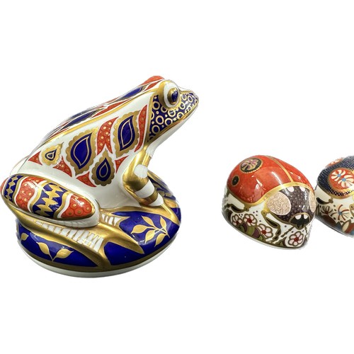 412 - Three Royal Crown Derby Paperweights, Frog, decorated in the Imari palate, gold stopper, red Royal C... 