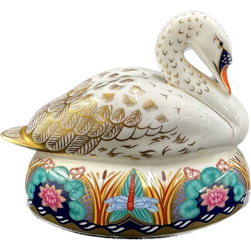 420 - Two Royal Crown Derby Paperweights, White Swan nesting and Robin Nesting, both with silver stoppers ... 