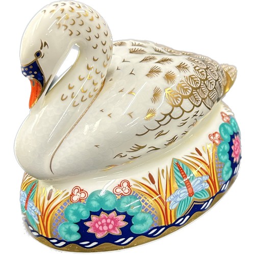 420 - Two Royal Crown Derby Paperweights, White Swan nesting and Robin Nesting, both with silver stoppers ... 