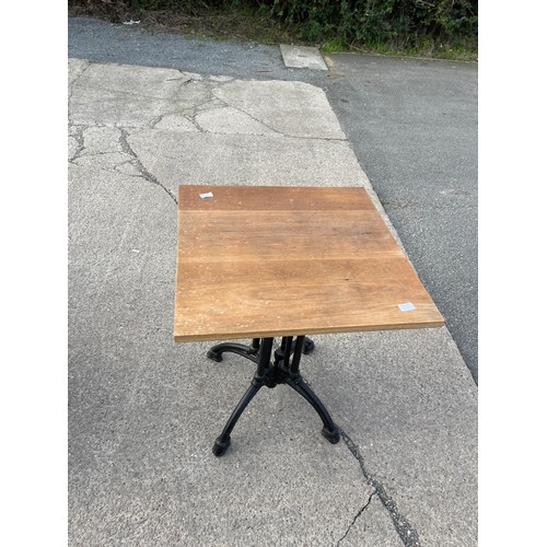 362 - Wrought iron base oak topped pub table 28 inches tall 24 inches square