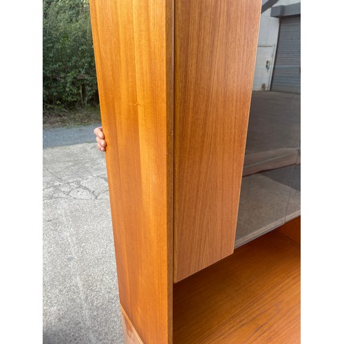 344 - Retro teak jasper 4 door cabinet measures approximately 71 inches tall 19.5 inches depth 35 inches w... 