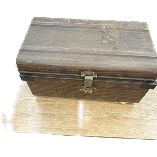 377 - Vintage tin trunk measures approx 21 inches wide by 12 inches deep and 22 inches tall