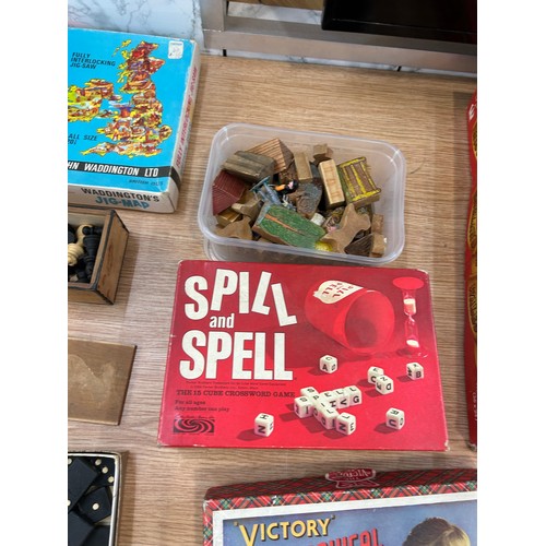 154 - Selection of vintage games to include monopoly, chest pieces, domino's etc