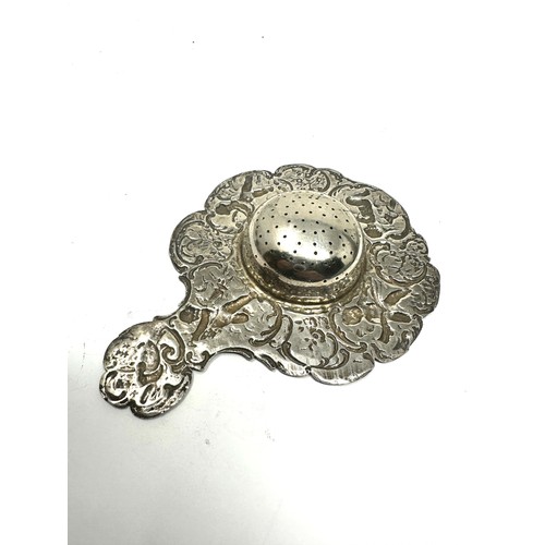 54 - silver tea strainer / spoon