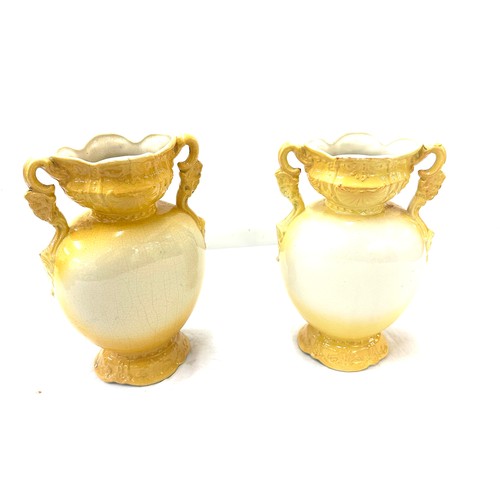 25 - Pair of vases measures approximately 10 inches tall