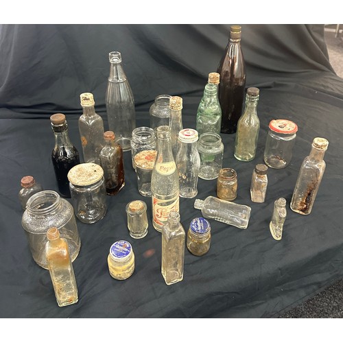 206 - Large selection of vintage and later glass bottles includes pepsi cola bottle, medicine bottles etc