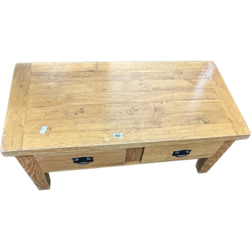 383 - Pine 2 drawer coffee table measures approximately 18 inches tall 43 inches wide 22 inches depth