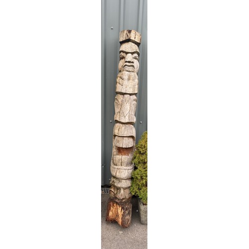 100Q - Large vintage carved totem pole measures approx 83 inches tall x 10 inches wide