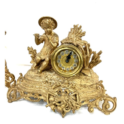 20 - 2 Gilded Spelter mantel clock, untested, measures approximately 12.5 inches