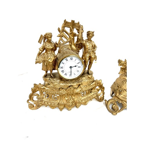 20 - 2 Gilded Spelter mantel clock, untested, measures approximately 12.5 inches