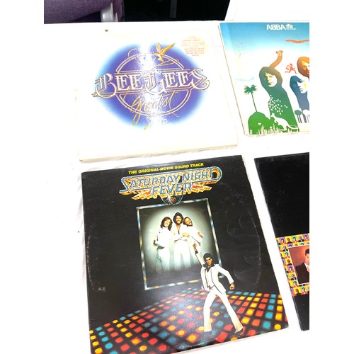 38 - Selection of vintage records includes level 42, Bee gees, 3 degrees, carpenters etc