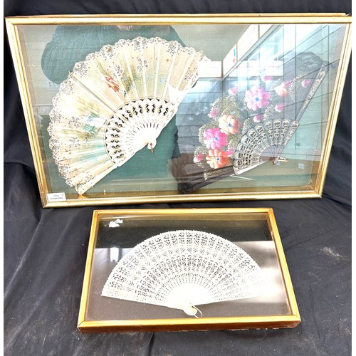 69 - 2 Framed vintage fan pictures largest measures approximately 25 inches wide 25 inches tall