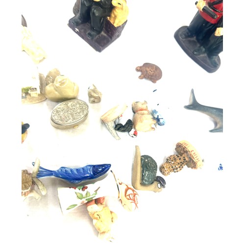 91 - Selection of porcelain ornament figures to include pot clowns etc