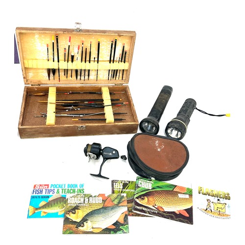 75 - Selection of vintage fishing equipment to include floats, reels etc