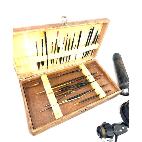 75 - Selection of vintage fishing equipment to include floats, reels etc