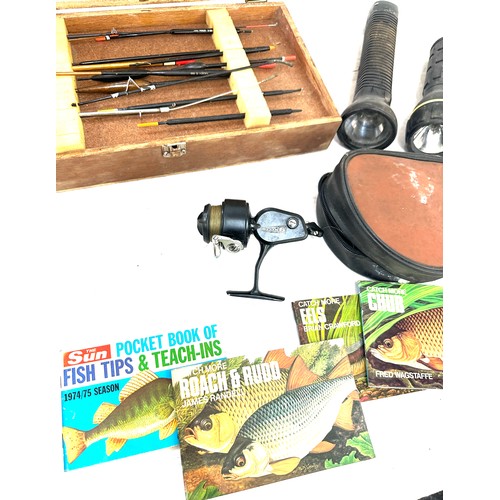 75 - Selection of vintage fishing equipment to include floats, reels etc