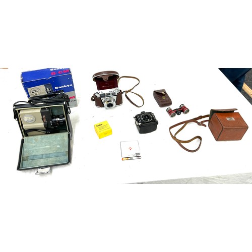 34 - Selection of vintage cameras and items to include Sankyo 8-cm micro zoom, Baby Brownie, Kodak, all u... 