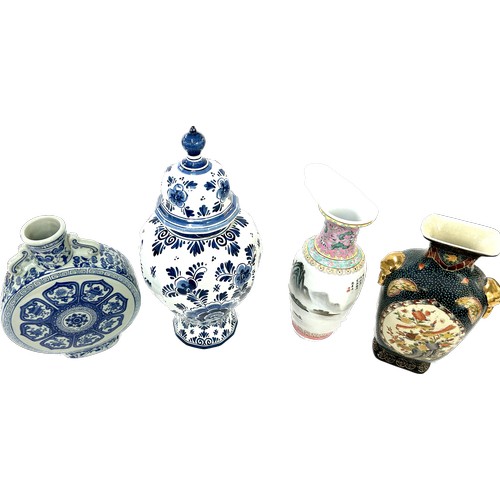 57 - Selection of oriental vases and a delft vase (a/f), tallest piece measures approximately 17 inches