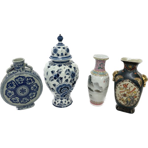 57 - Selection of oriental vases and a delft vase (a/f), tallest piece measures approximately 17 inches