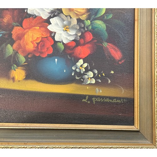 92 - Two gilt framed vintage signed paintings depicting floral arrangements largest measures approx 23 in... 