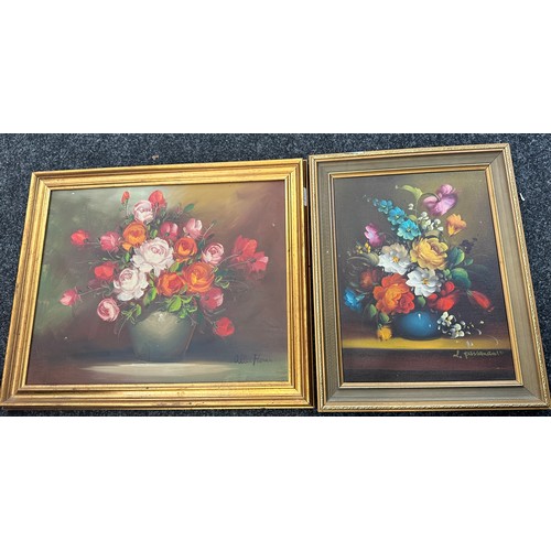 92 - Two gilt framed vintage signed paintings depicting floral arrangements largest measures approx 23 in... 