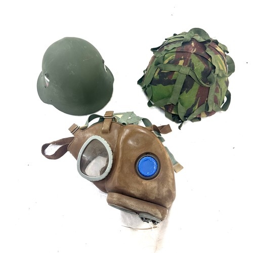 78 - 2 Vintage military helmets, 1 gas mask