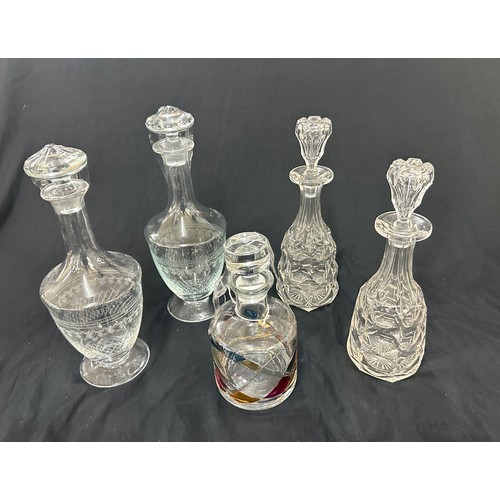 46 - Selection of glass decanters with stoppers, to include a pairs of etched