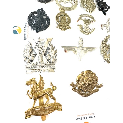 474 - Selection of vintage military cap badges