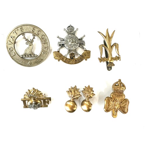 474 - Selection of vintage military cap badges