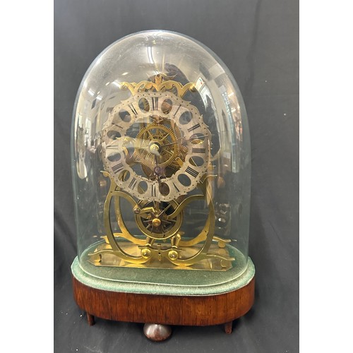 431 - Vintage skeleton mantel clock in dome with pendulum measures approx 13 inches tall, untested