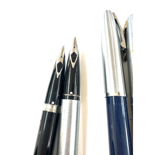 561 - Eight Sheaffer fountain pens most with inlaid nib plus a set with inlaid nib and pencil