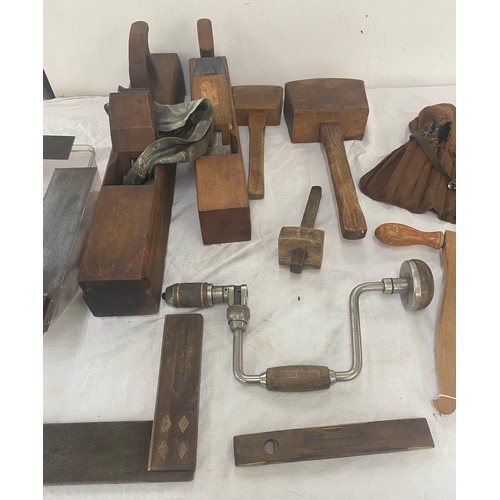 135 - Large selection of assorted tools includes wood working tools, hand held drill, level etc