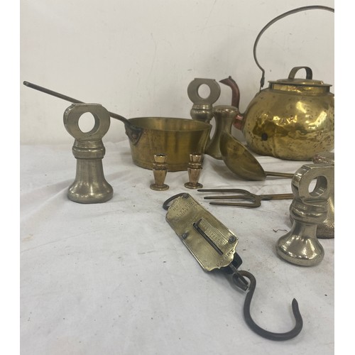 115 - Selection of brass and copper ware includes weights, brass kettle etc