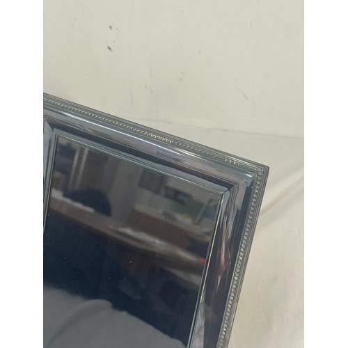 493 - Pair of Carrs Silver plated photo frames, photo size 20 x 15cm