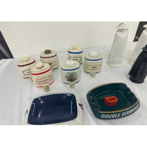 96 - Selection of drinking ephemera includes wedgwood moonstone sandeman decanters, wade, wade barrels, a... 