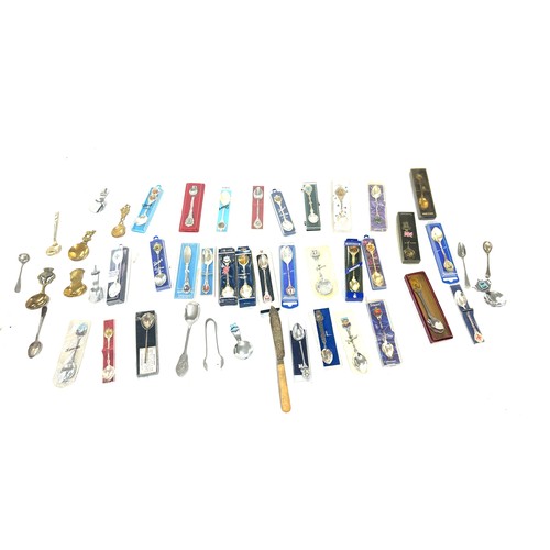 121 - Large selection of souvenir spoons