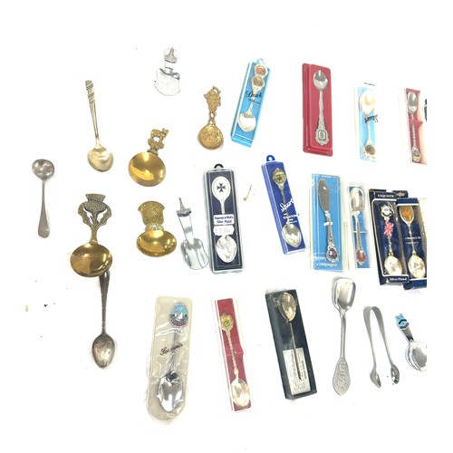 121 - Large selection of souvenir spoons