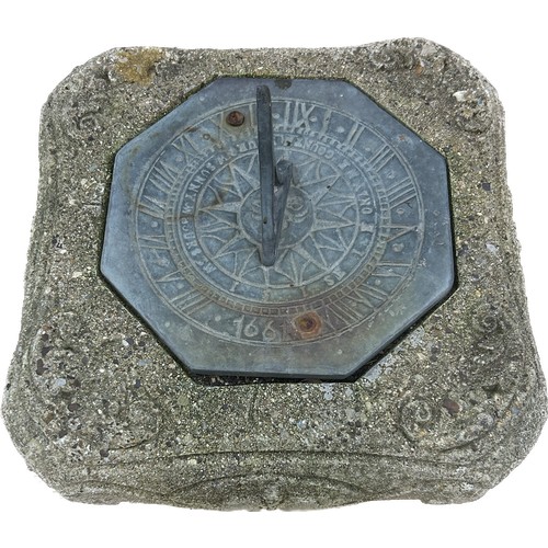 108 - Octagonal 1661 sundial encased with a concrete base, approximate overall measurements 9 x 9 inches, ... 