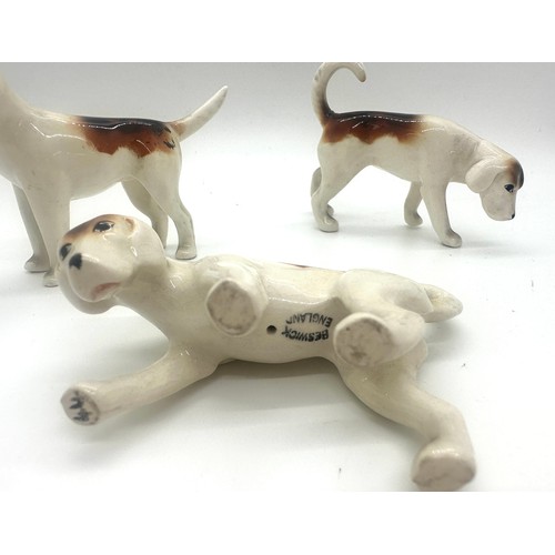 395 - Beswick horse prancing Arab model 1261 Palamino gloss, Beswick Donkey, 3 Beswick hounds, all in good... 