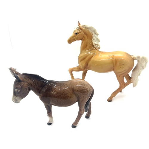 395 - Beswick horse prancing Arab model 1261 Palamino gloss, Beswick Donkey, 3 Beswick hounds, all in good... 