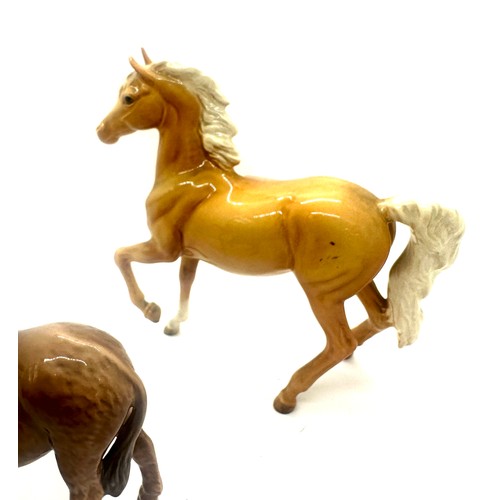 395 - Beswick horse prancing Arab model 1261 Palamino gloss, Beswick Donkey, 3 Beswick hounds, all in good... 