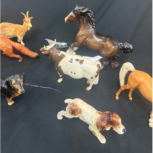 402 - Selection Beswick ornaments all have sustained some form of small damage to include a fox, horses, b... 