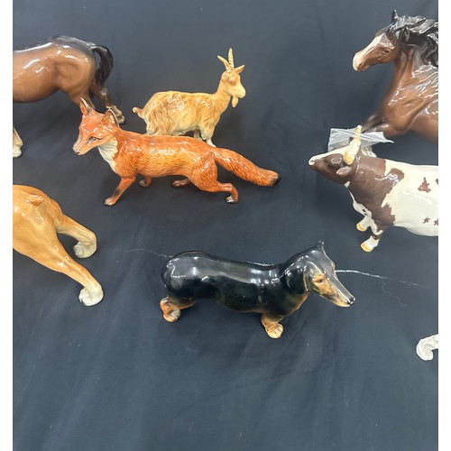 402 - Selection Beswick ornaments all have sustained some form of small damage to include a fox, horses, b... 