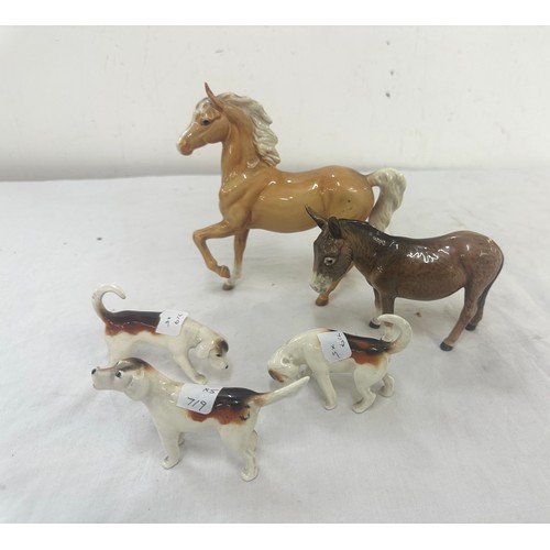 395 - Beswick horse prancing Arab model 1261 Palamino gloss, Beswick Donkey, 3 Beswick hounds, all in good... 