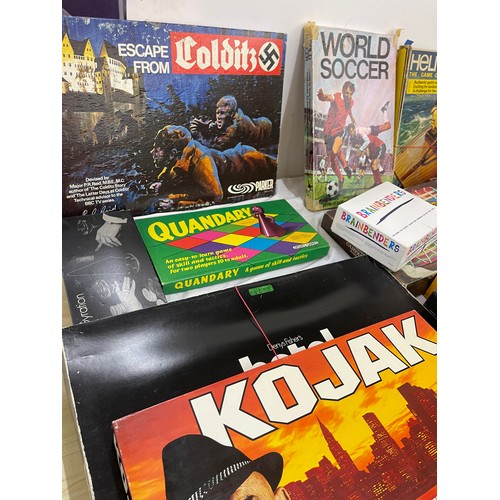 132 - Large selection of assorted games includes world soccer, Helmsman, loose your shirt etc