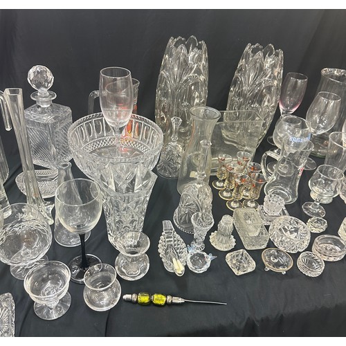 297 - Large selection of glassware to include a pair matching heavy glass vases, decanter, bowls, glasses ... 