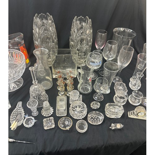 297 - Large selection of glassware to include a pair matching heavy glass vases, decanter, bowls, glasses ... 