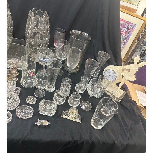 297 - Large selection of glassware to include a pair matching heavy glass vases, decanter, bowls, glasses ... 