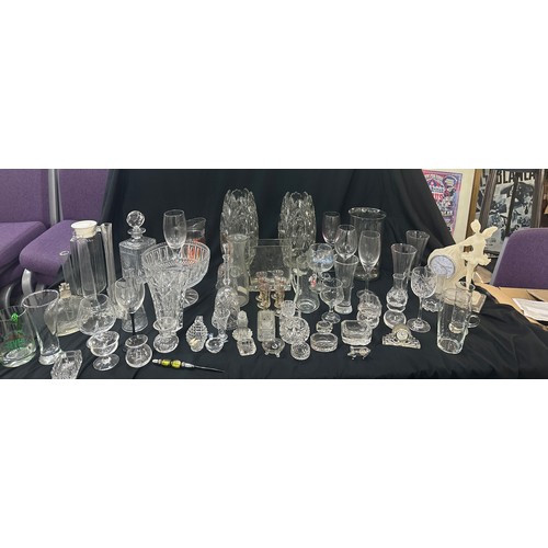 297 - Large selection of glassware to include a pair matching heavy glass vases, decanter, bowls, glasses ... 